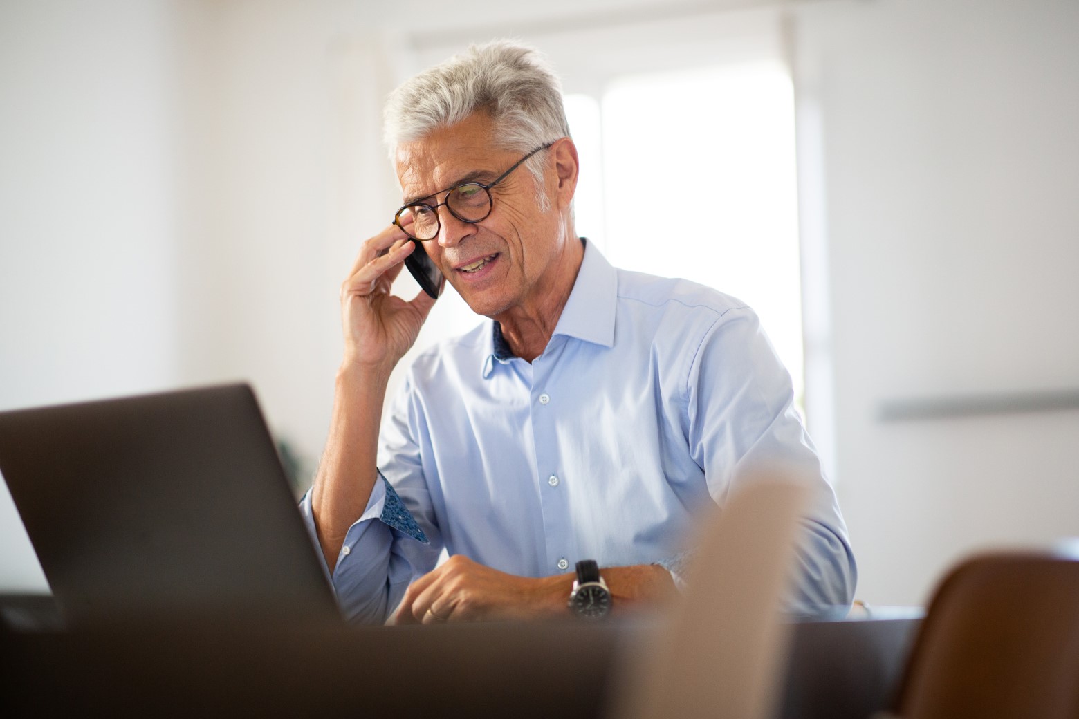 businessman sitting at office desk